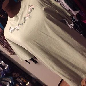 Light green T shirt with embroidered neckline
